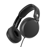 Black over-ear wired headphones with cushioned ear pads and a padded headband, shown at an angle on a solid black background. A small white skull logo is visible on the headband. |True Black