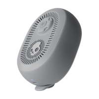 Gray speaker with a circular design on a white background | Cement