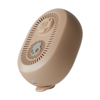 Beige speaker with a white background | Primer